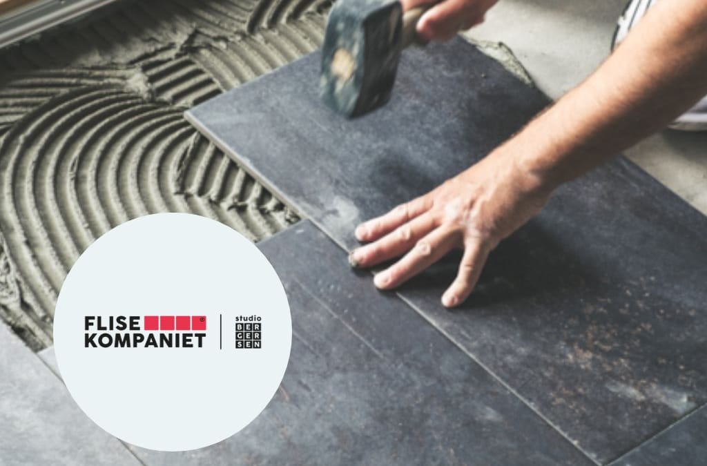 Bilde av en som legger fliser. Foto: Canva